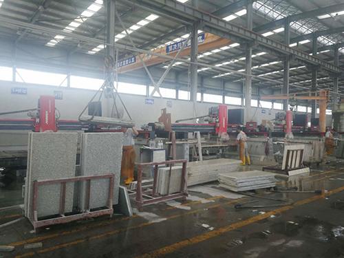 Compra por parte do Wanli Stone Group da máquina CNC para corte de granito