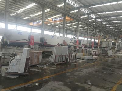 Compra por parte do Wanli Stone Group da máquina CNC para corte de granito